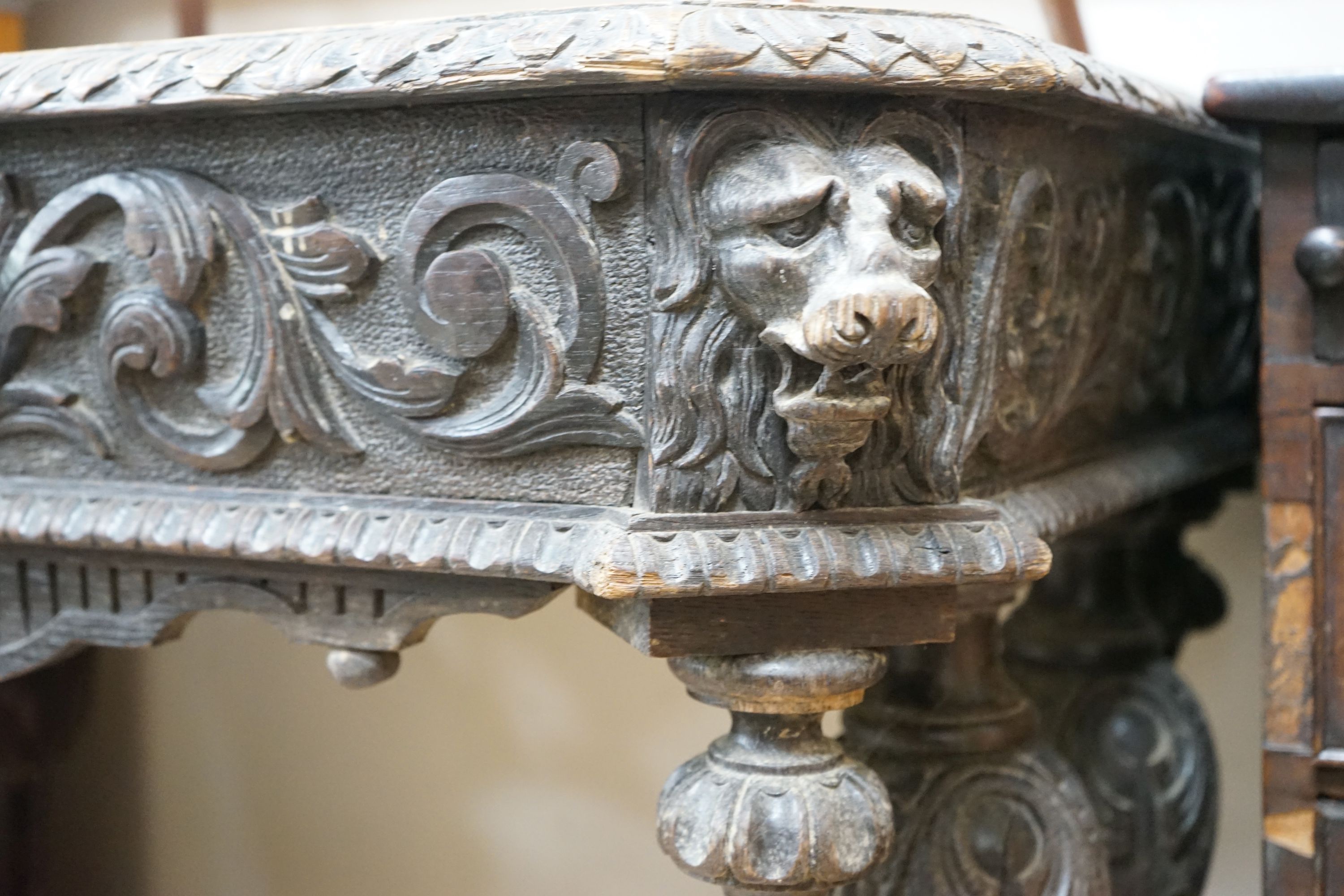 A late 19th century Flemish octagonal carved oak centre table, width 80cm, depth 60cm, height 72cm